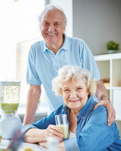 Happy senior couple smiling, content with their Medicare Advantage Plans in Hoover, Alabama.